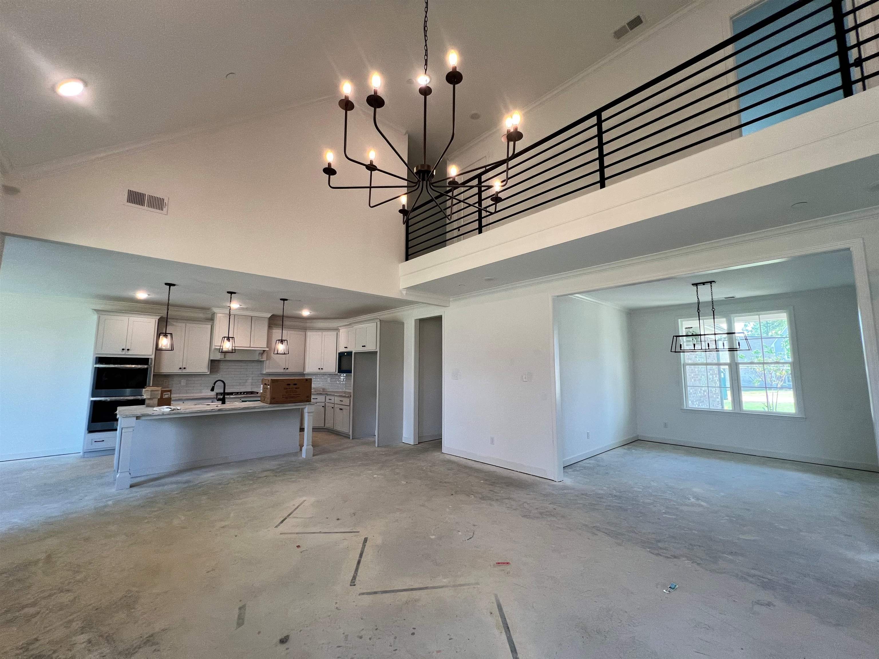 240 Drake Drive Collierville, TN 38017 - Photo 6 of 10 a view of a kitchen and chandelier area