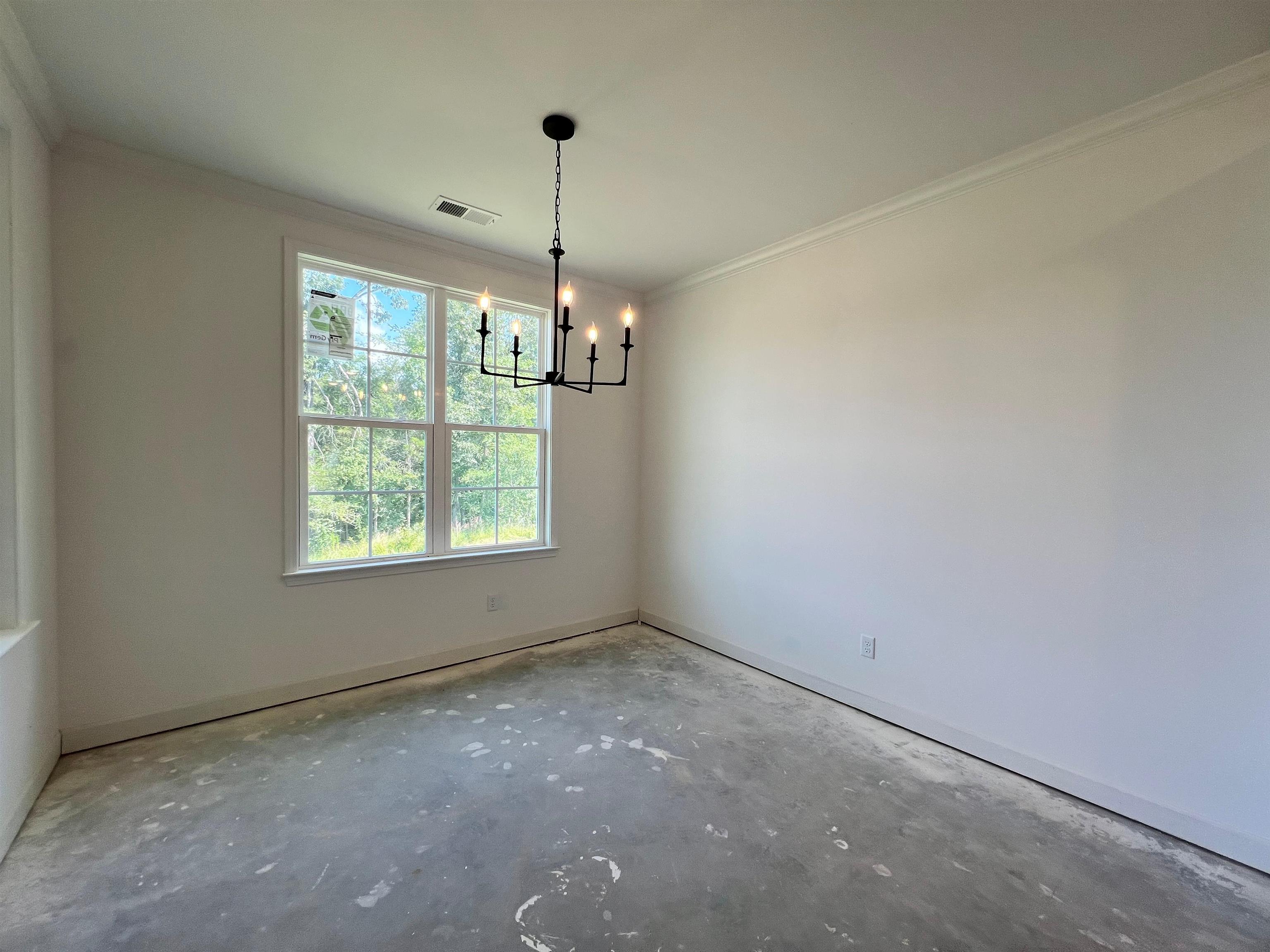 240 Drake Drive Collierville, TN 38017 - Photo 9 of 10 a view of an empty room with windows