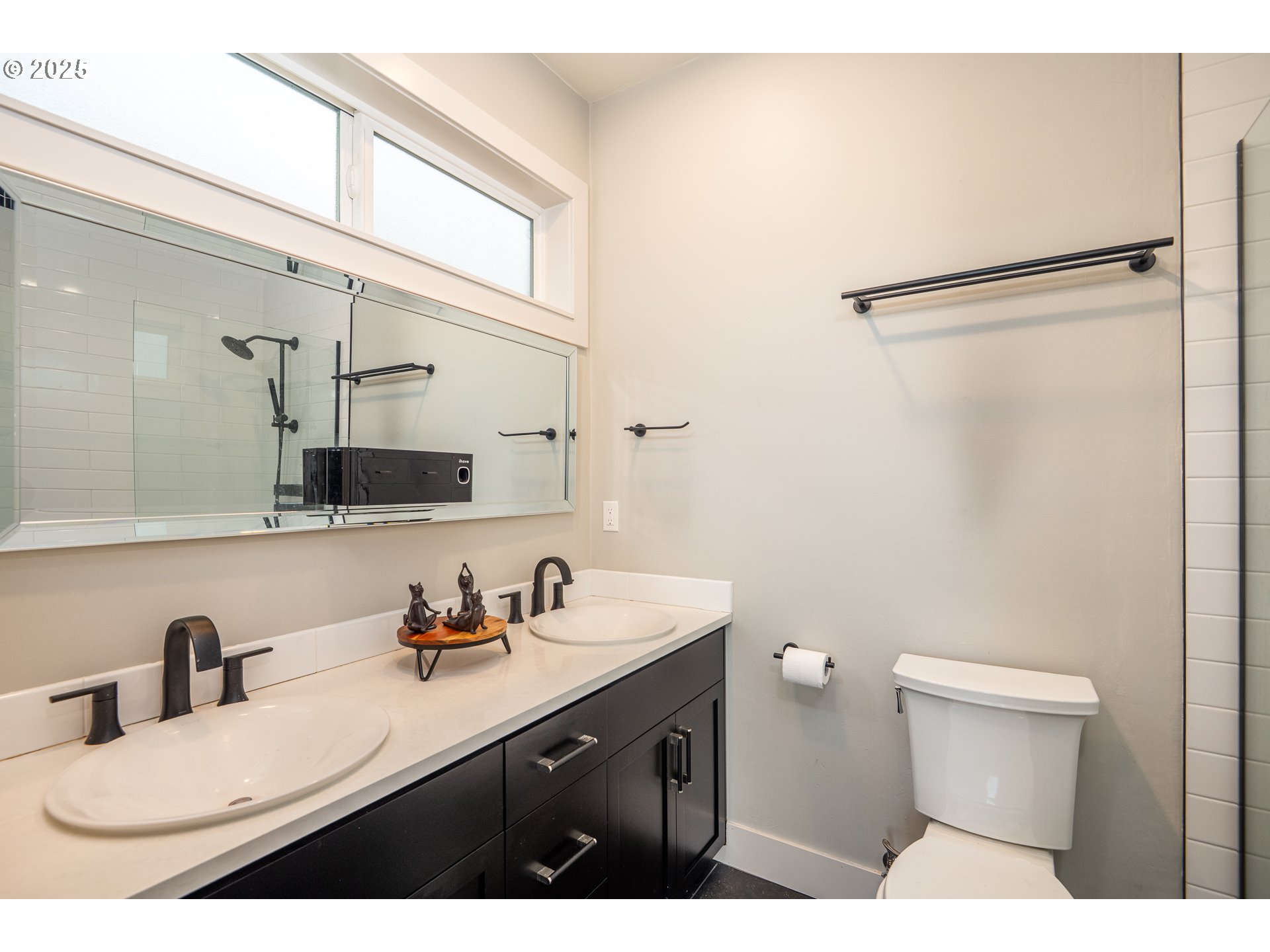 3346 Zane Lane Eugene, OR 97404 - Photo 15 of 47 a bathroom with a sink and a mirror