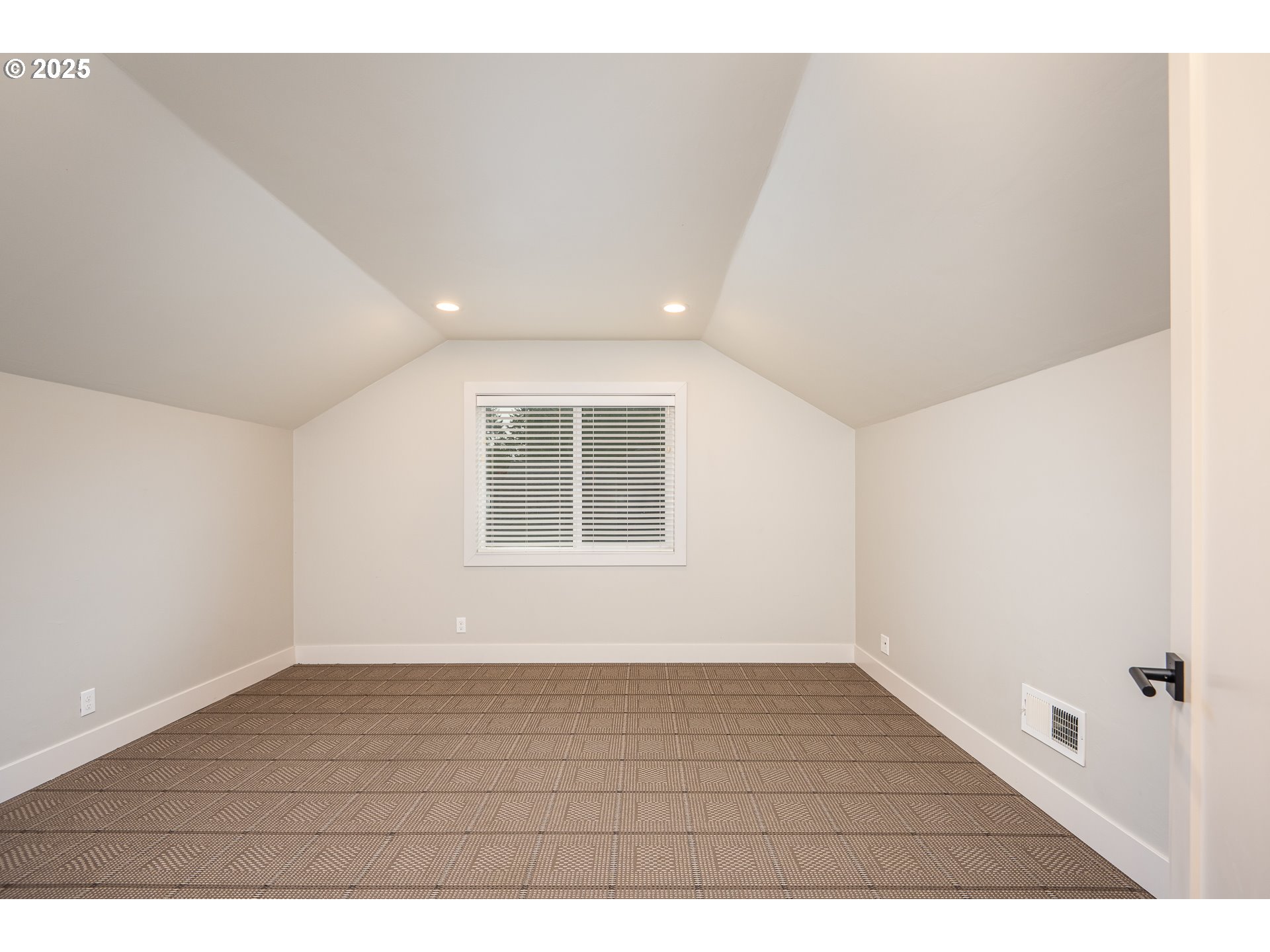 3346 Zane Lane Eugene, OR 97404 - Photo 19 of 47 a view of an empty room with wooden floor and a window