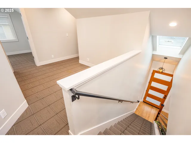 a bathroom with a sink toilet a mirror and shower