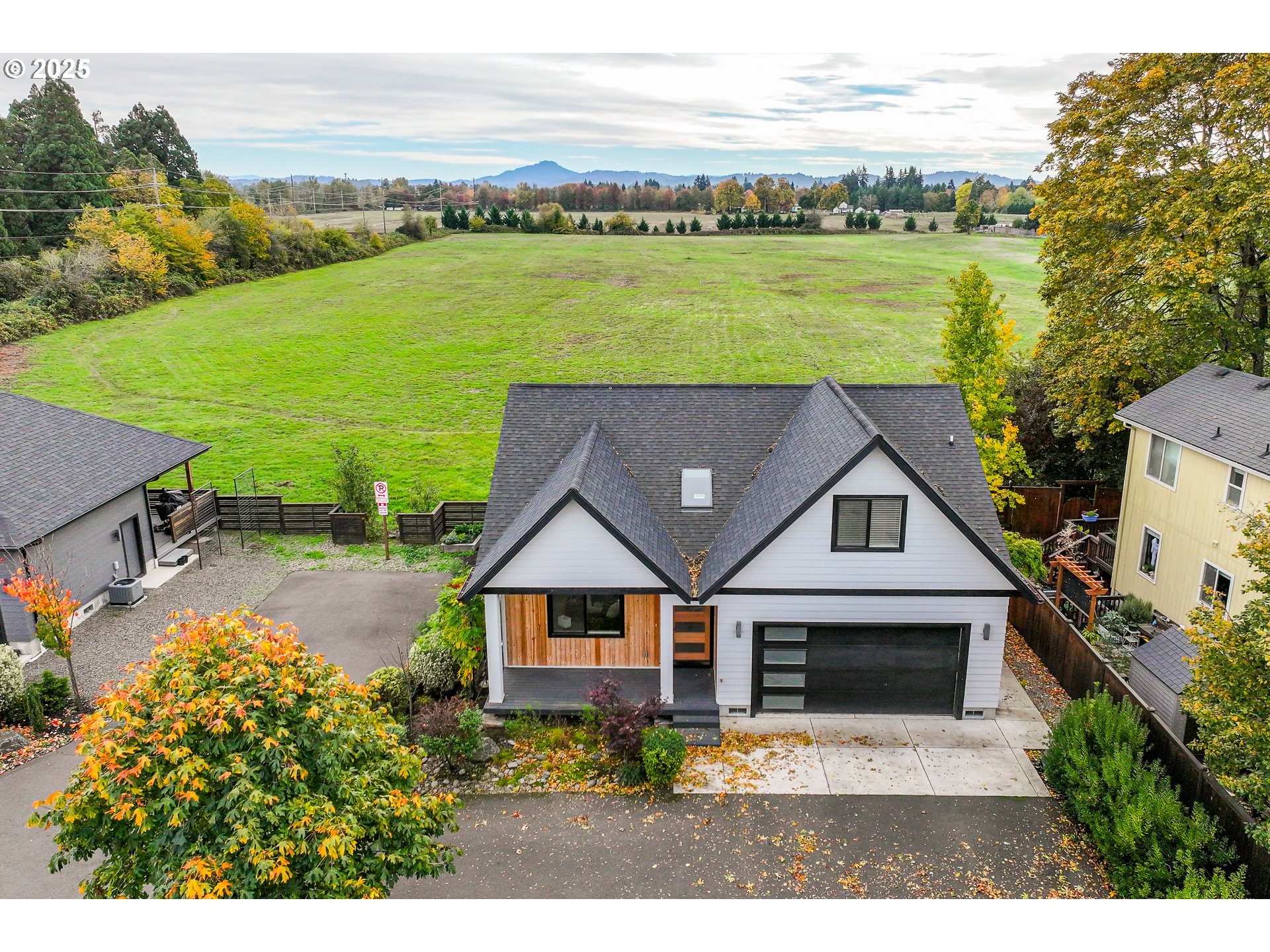 3346 Zane Lane Eugene, OR 97404 - Photo 31 of 47 a view of a house with a garden and lake view