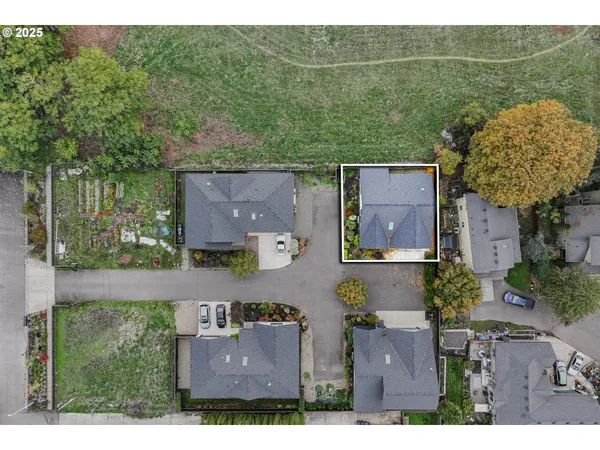 a aerial view of a house with a yard