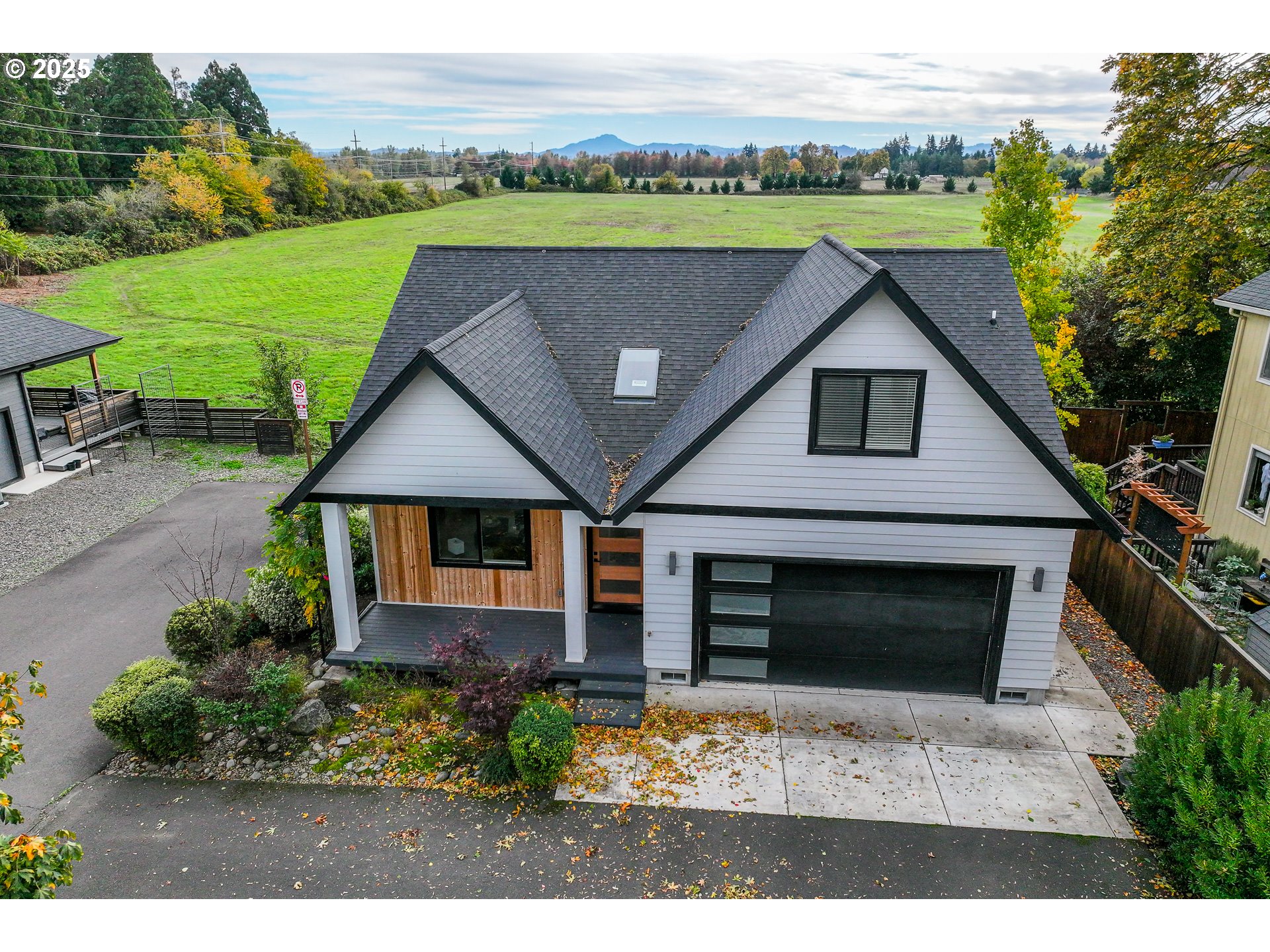3346 Zane Lane Eugene, OR 97404 - Photo 41 of 47 a aerial view of a house with a yard