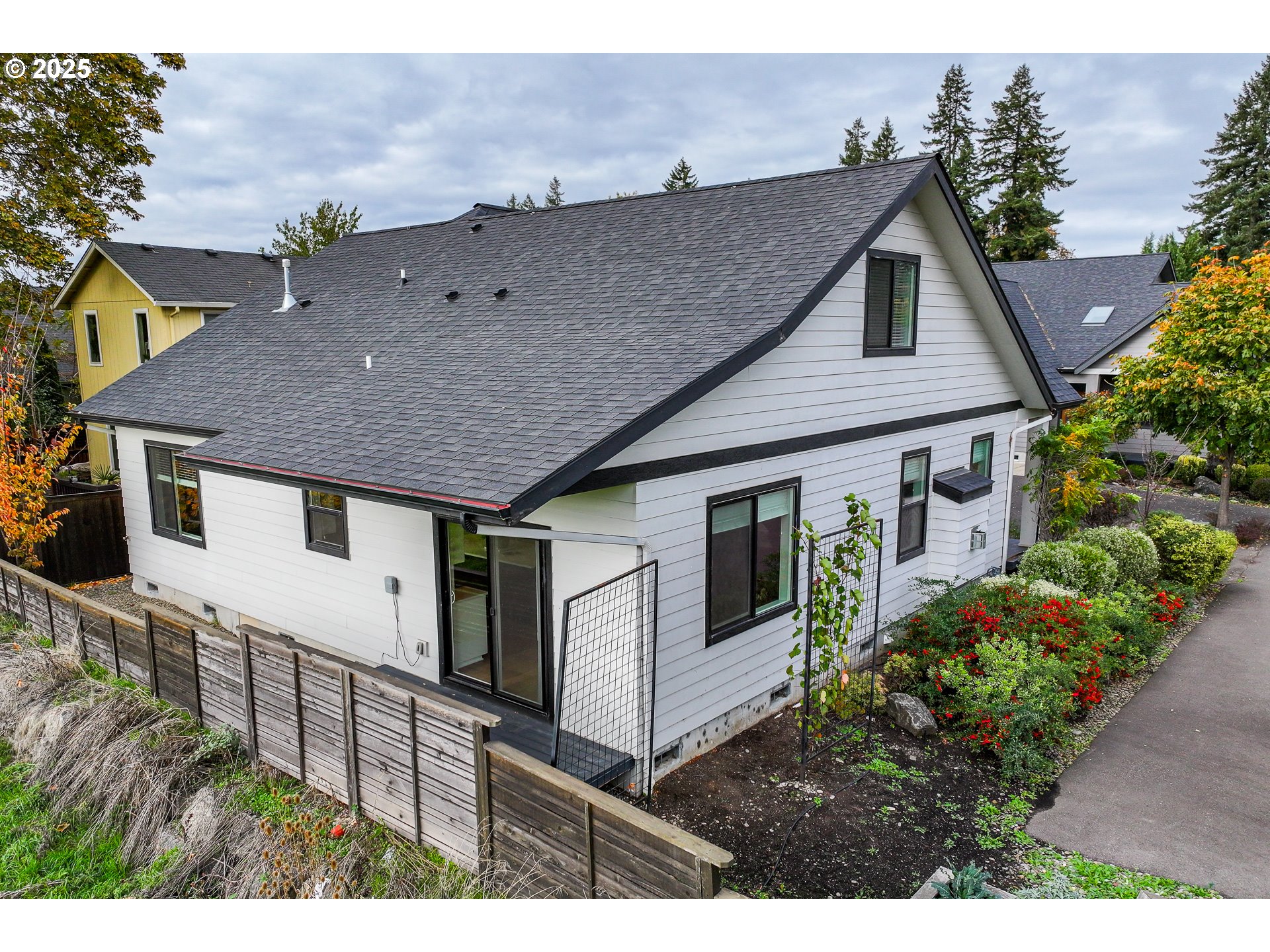 3346 Zane Lane Eugene, OR 97404 - Photo 42 of 47 a aerial view of a house with a yard