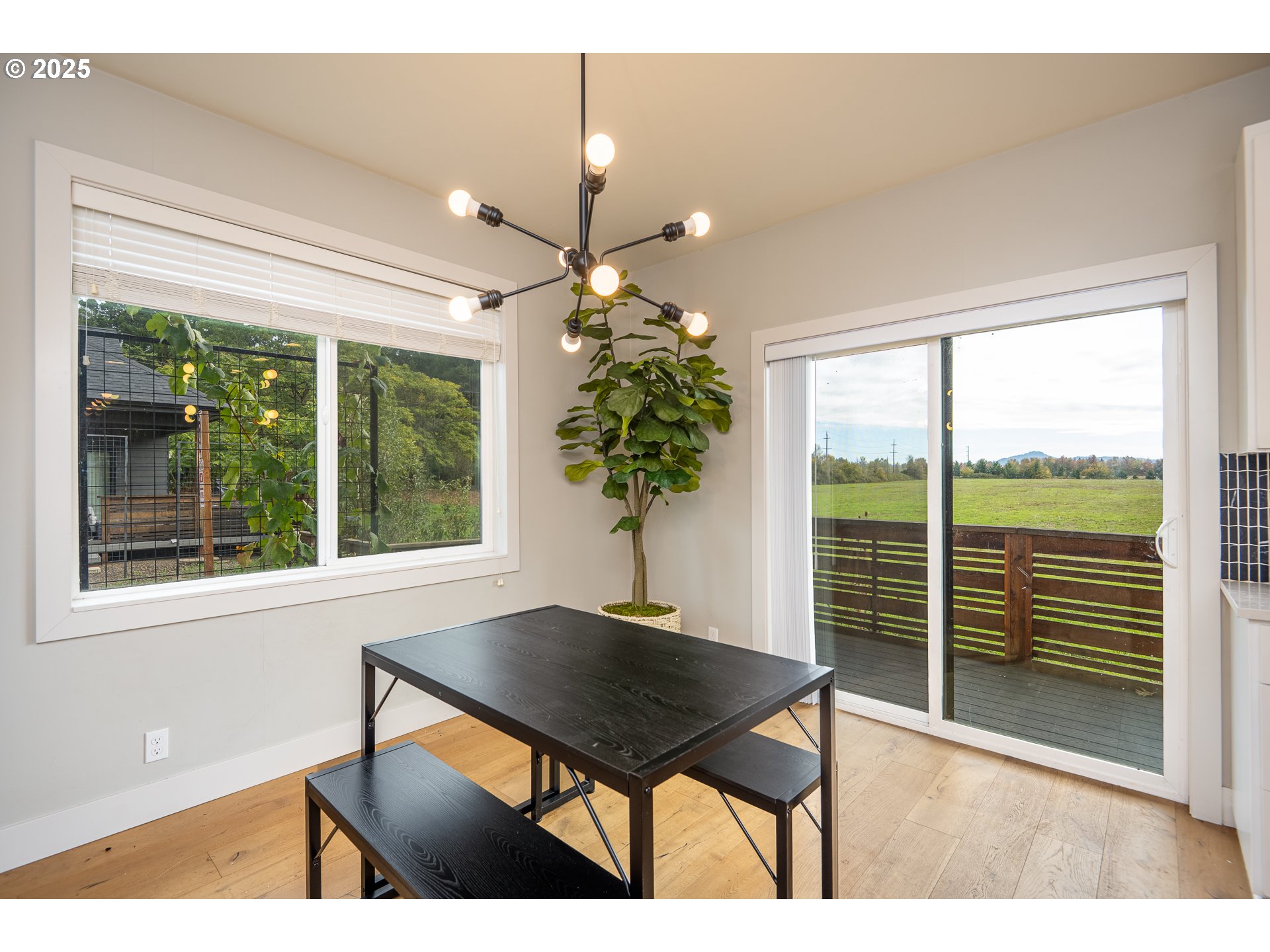 3346 Zane Lane Eugene, OR 97404 - Photo 7 of 47 a view of a room with a window and a table