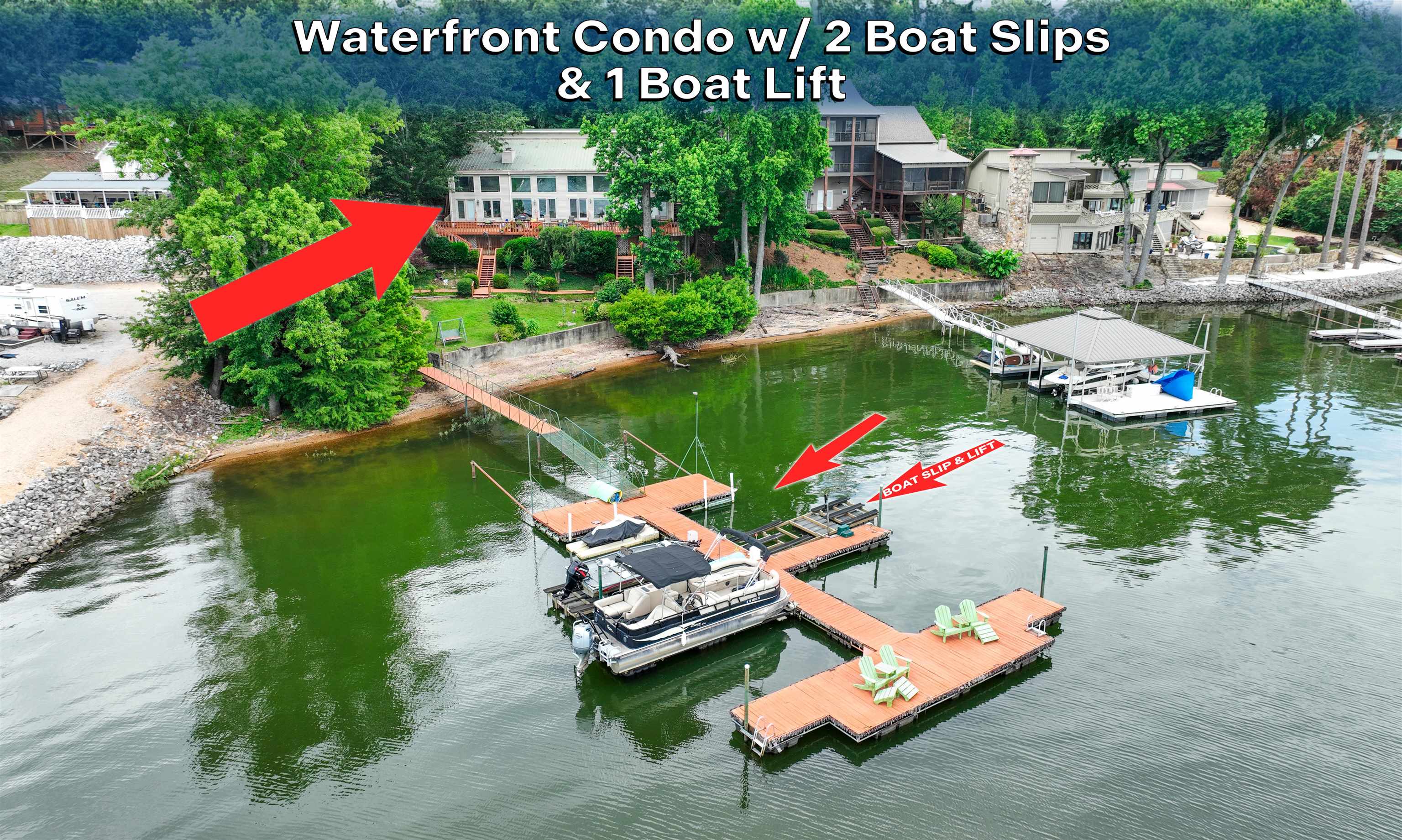 an aerial view of a house with a garden and lake view