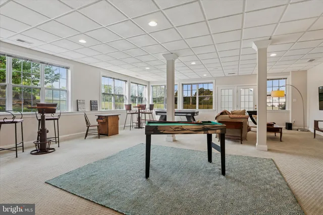 a view of a house with a yard and plants