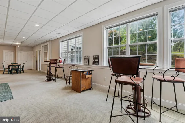 a view of a house with a yard and garage