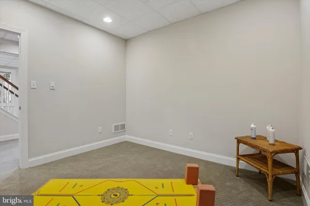 an aerial view of a house with a garden