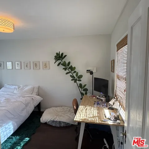 a view of a workspace with furniture