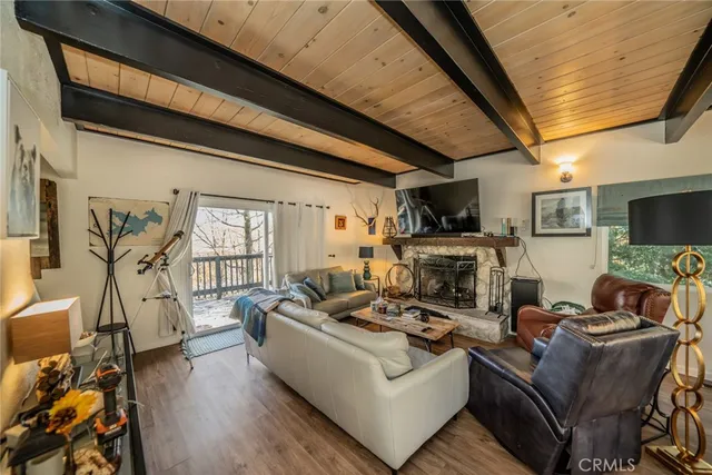 a room with furniture and a flat screen tv