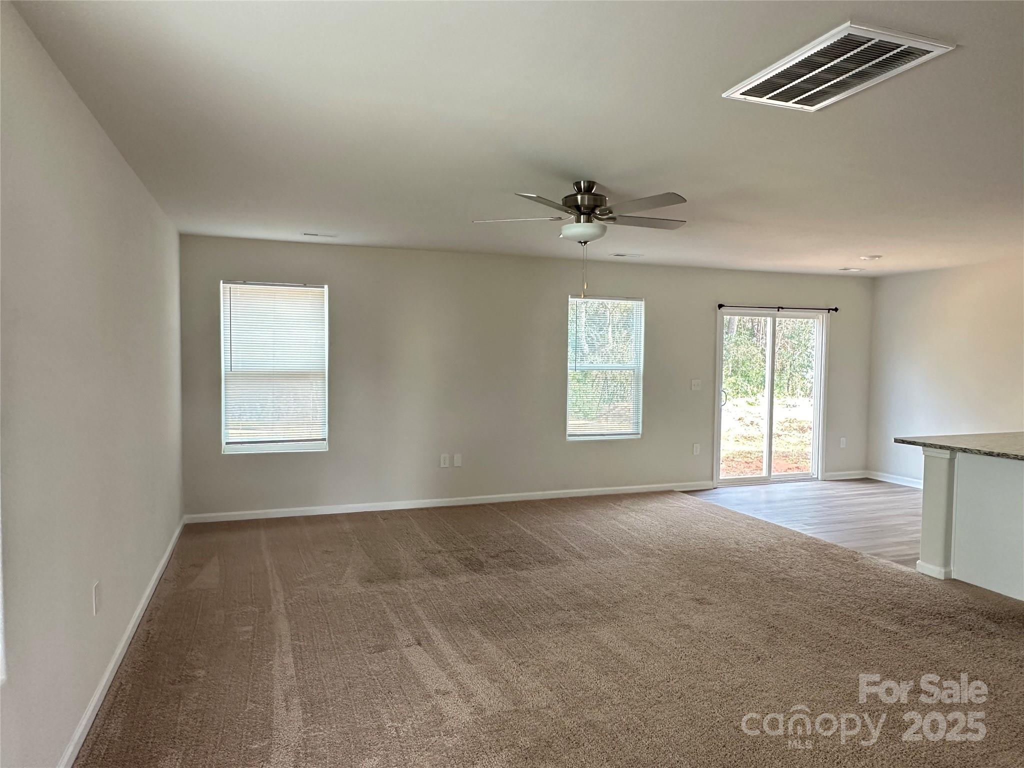 1345 Nia Road Charlotte, NC 28215 - Photo 2 of 19 a view of an empty room with a window
