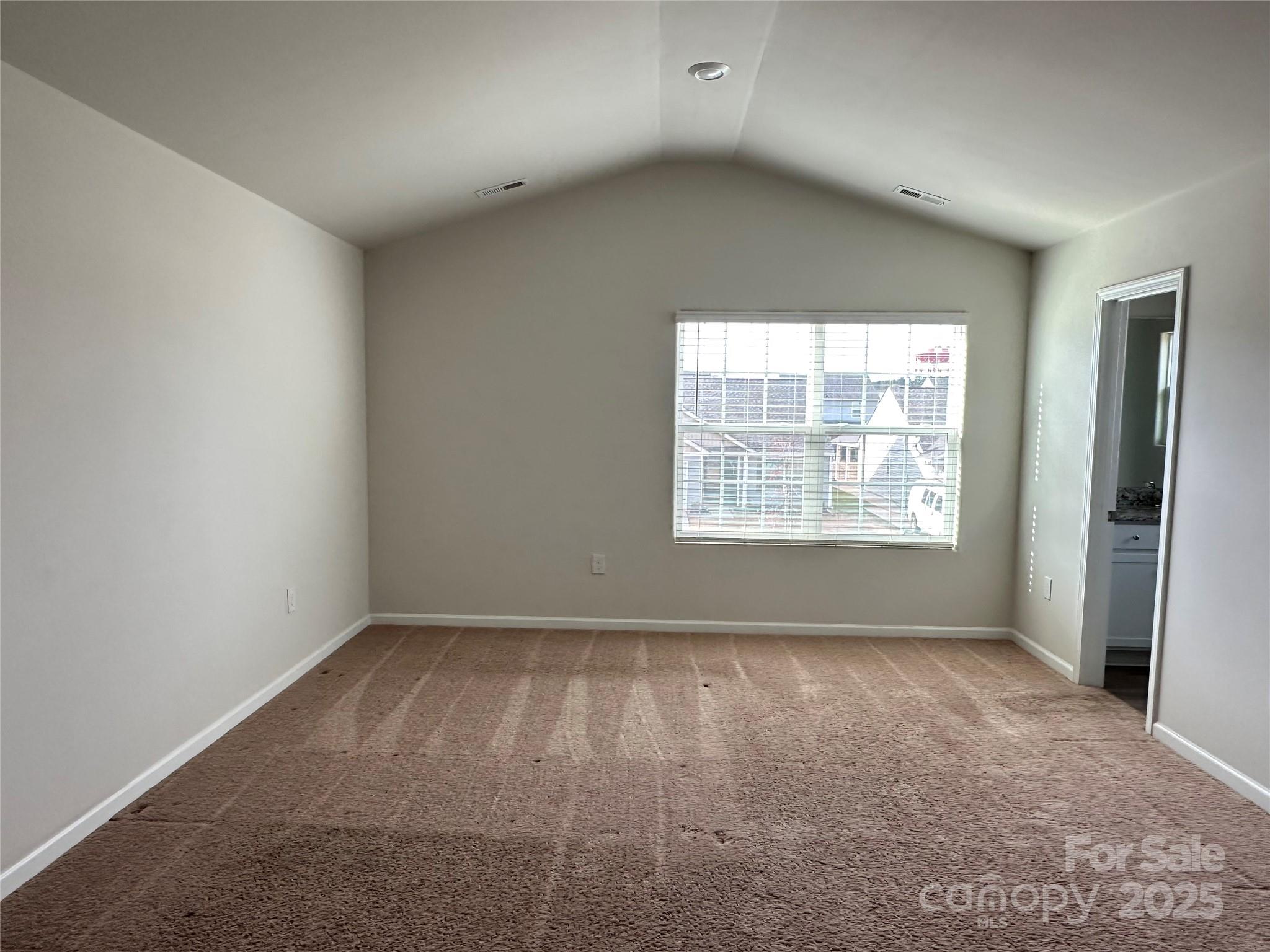 1345 Nia Road Charlotte, NC 28215 - Photo 8 of 19 an empty room with windows