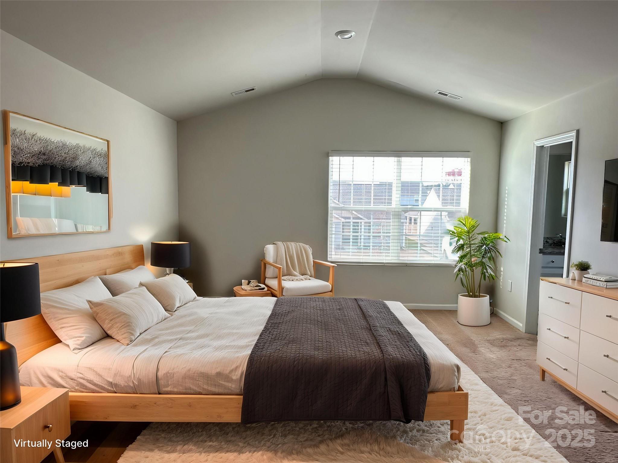 1345 Nia Road Charlotte, NC 28215 - Photo 9 of 19 a bedroom with a large bed and a window