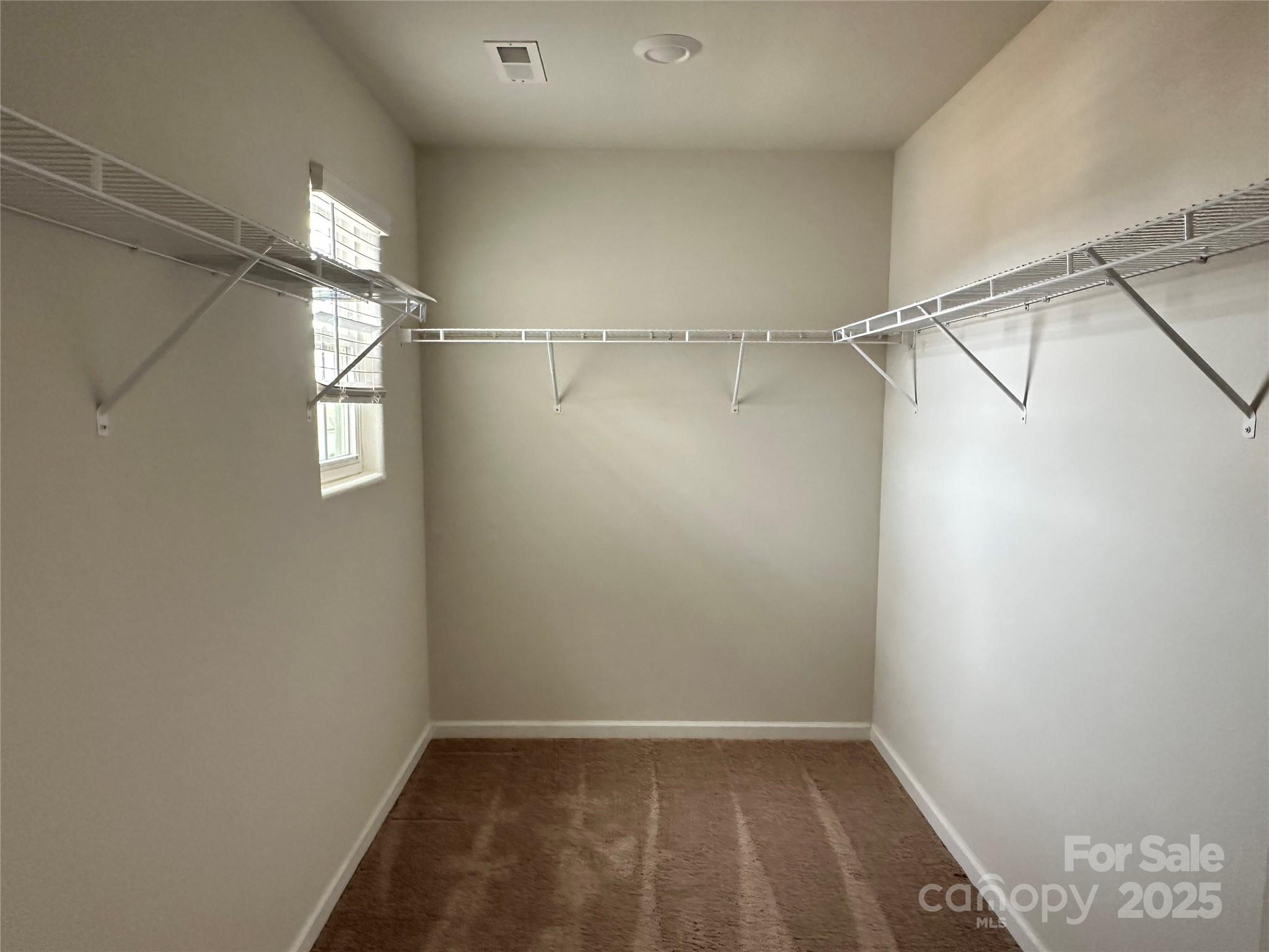 1345 Nia Road Charlotte, NC 28215 - Photo 10 of 19 a view of a room with racks on the wall