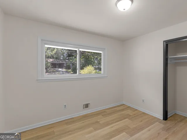 an empty room with a window