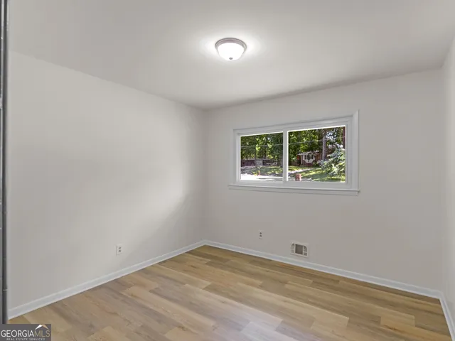 an empty room with a window