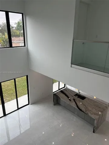 a bathroom with a toilet a sink and shower