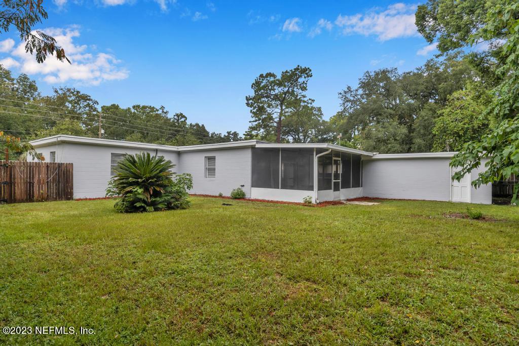 10625 Rutgers Road Jacksonville, FL 32218 - Photo 35 of 37 a front view of house with a garden