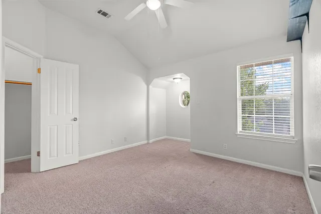 an empty room with windows