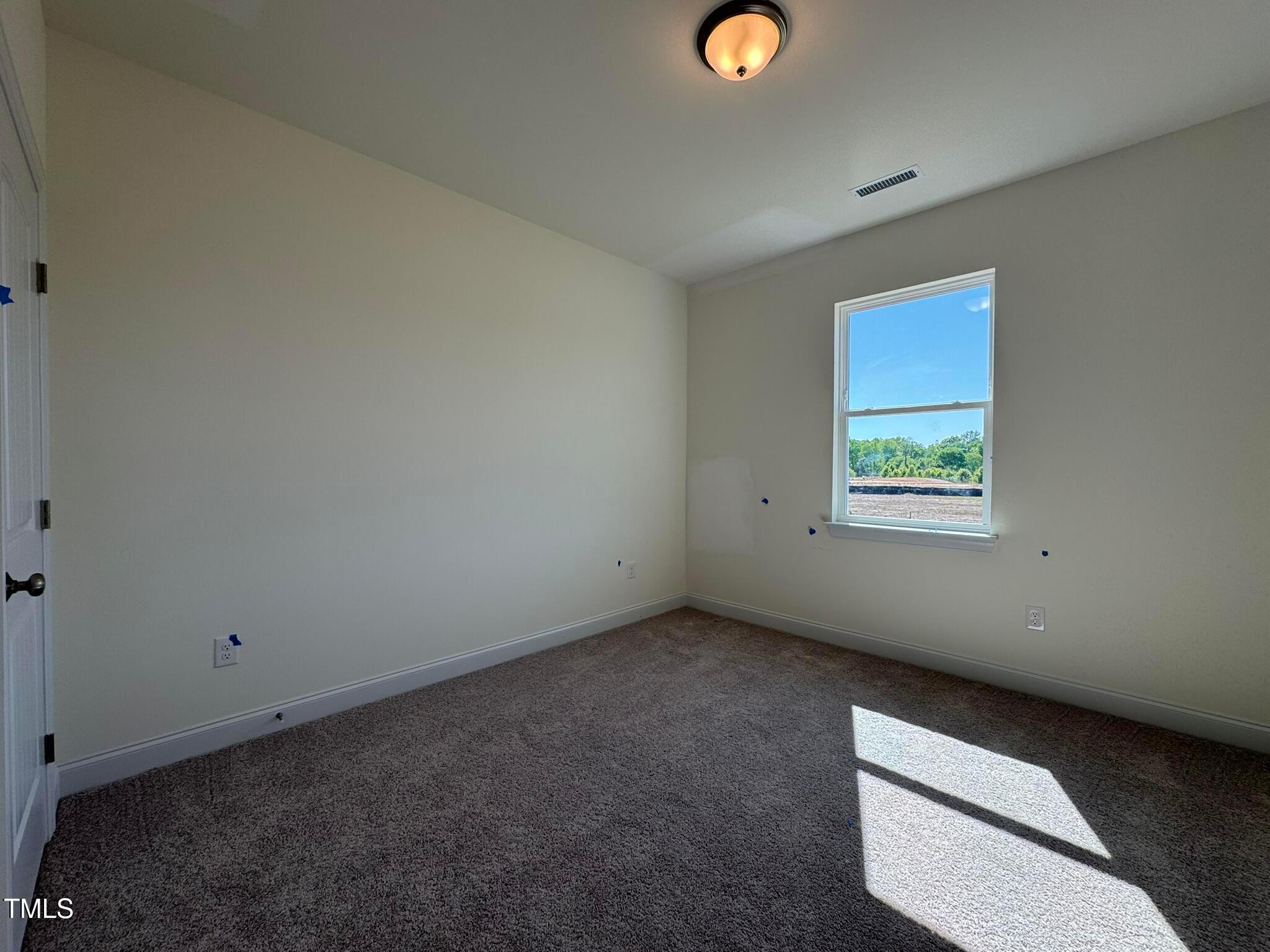 75 Steppe Way Garner, NC 27529 - Photo 13 of 39 a view of an empty room