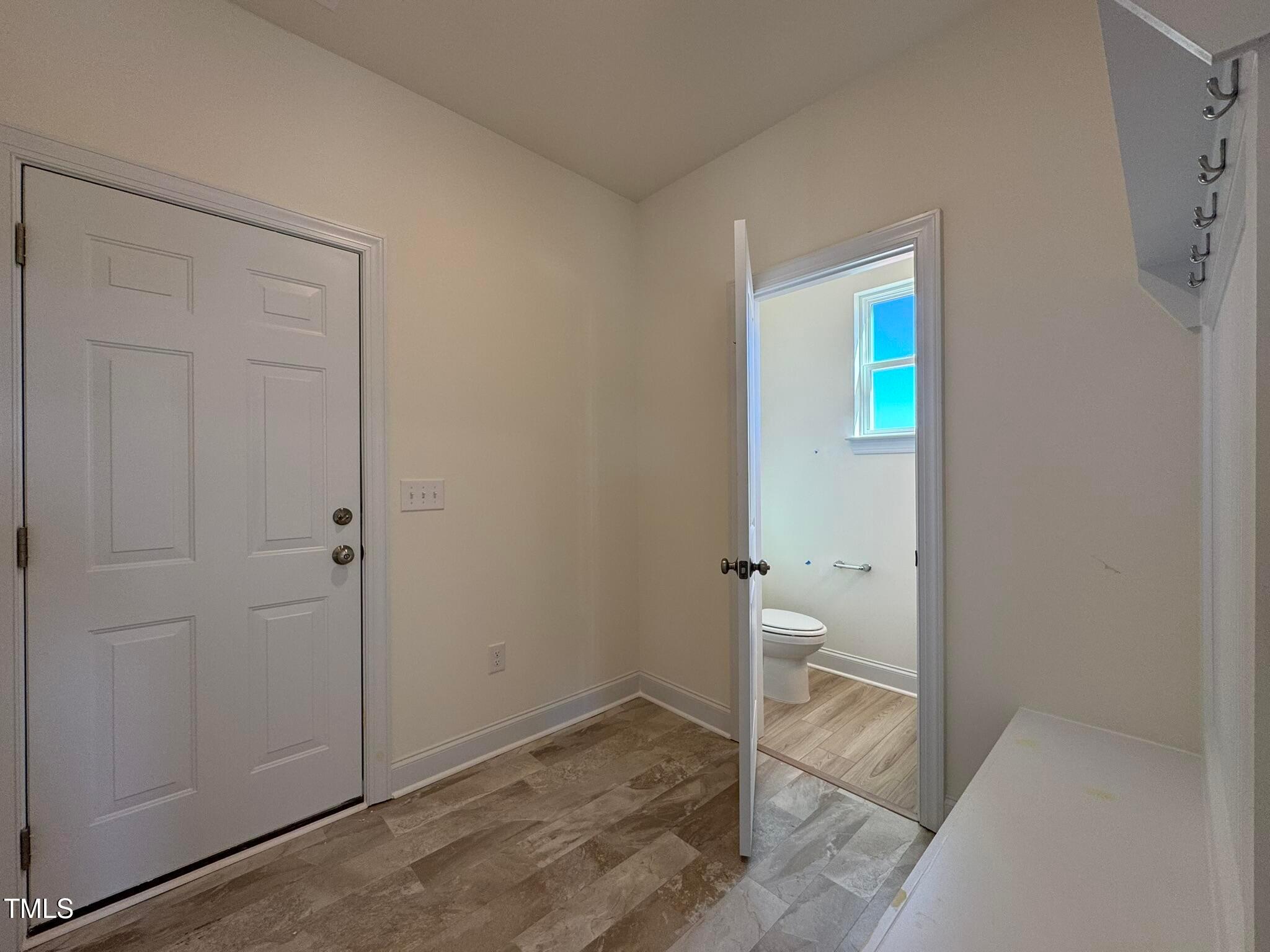 75 Steppe Way Garner, NC 27529 - Photo 16 of 39 a view of an empty room and a window