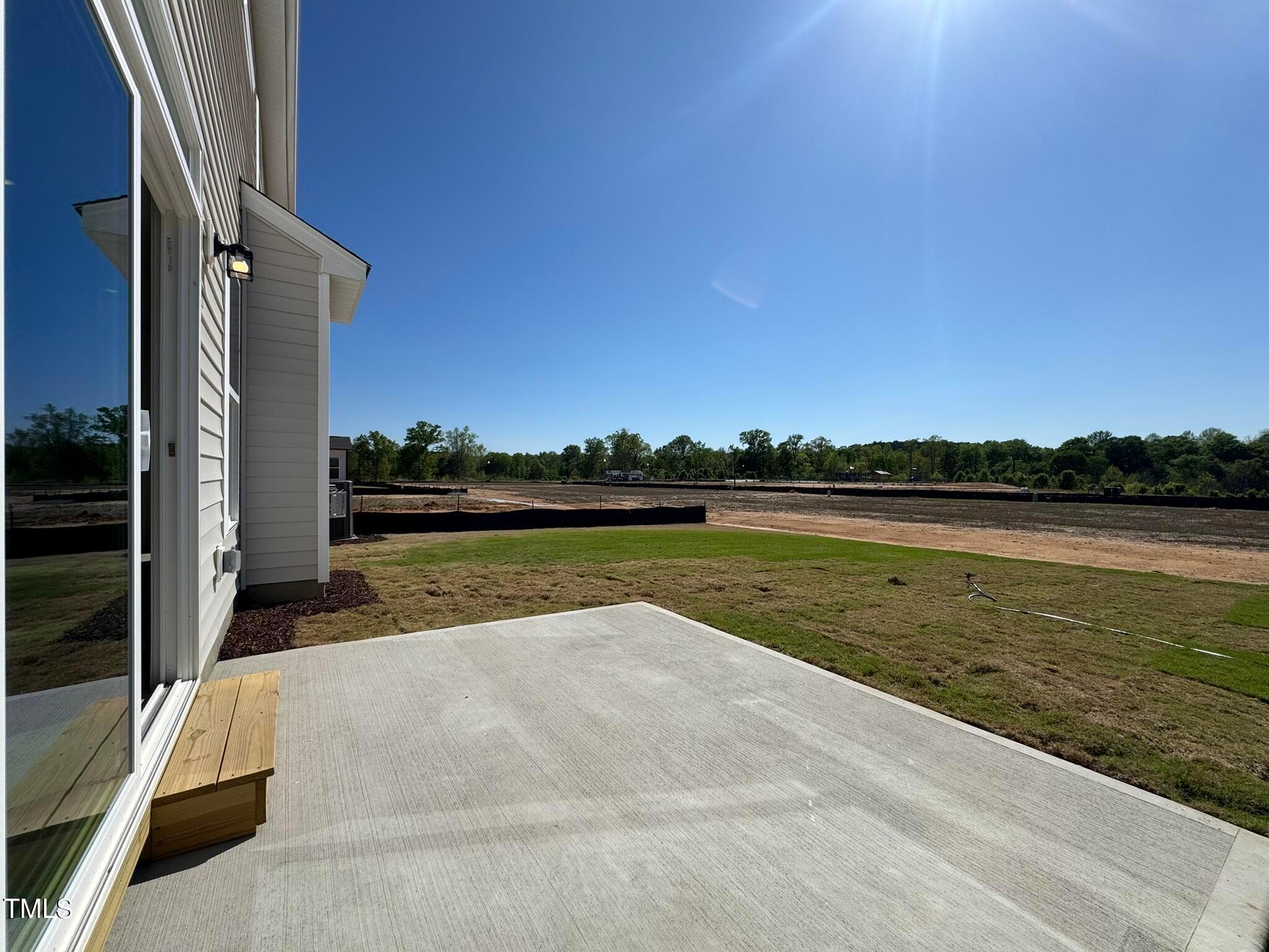 75 Steppe Way Garner, NC 27529 - Photo 19 of 39 a view of a lake with a outdoor space