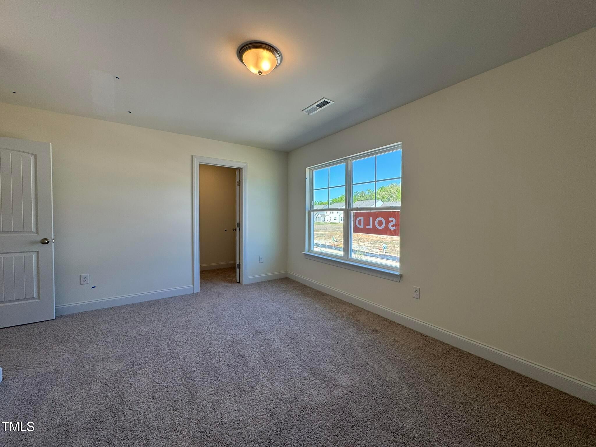 75 Steppe Way Garner, NC 27529 - Photo 35 of 39 an empty room with windows