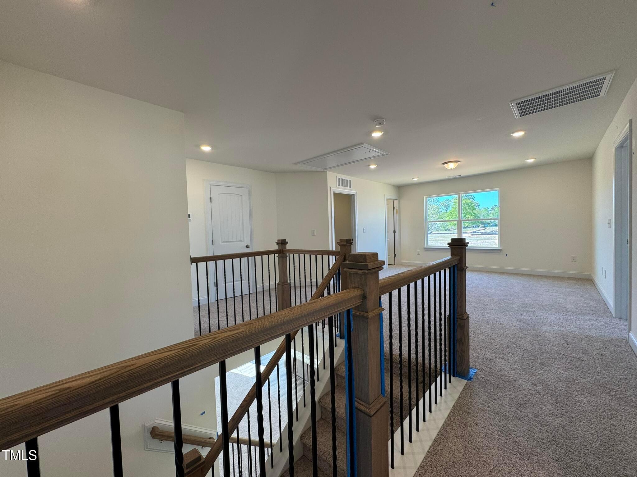75 Steppe Way Garner, NC 27529 - Photo 37 of 39 a view of a hallway with workspace