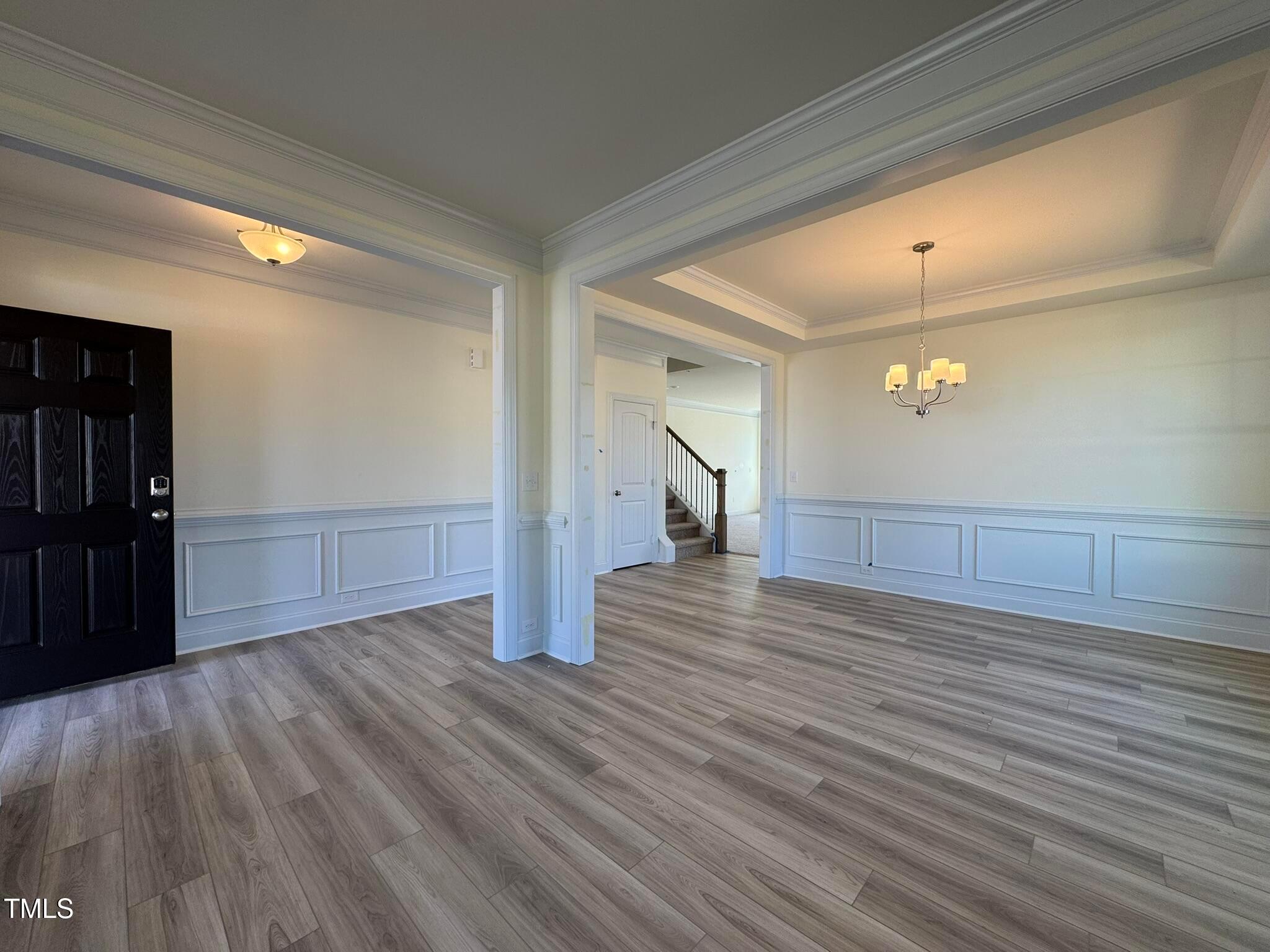 75 Steppe Way Garner, NC 27529 - Photo 4 of 39 a view of a room with wooden floor