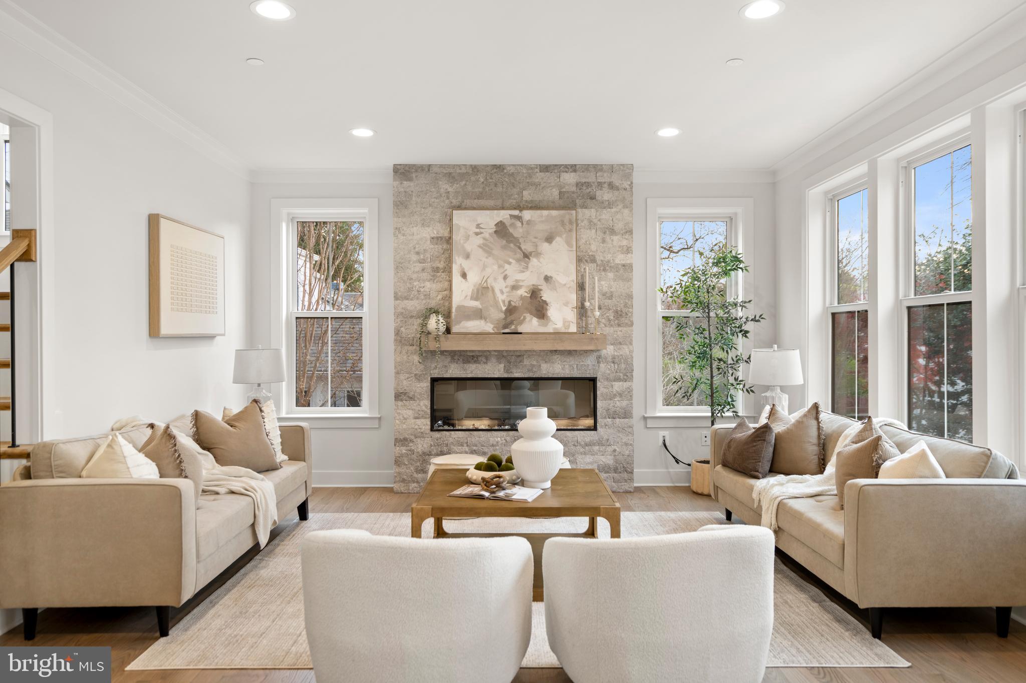 8506 Hempstead Avenue Bethesda, MD 20817 - Photo 12 of 57 a living room with furniture and a large window