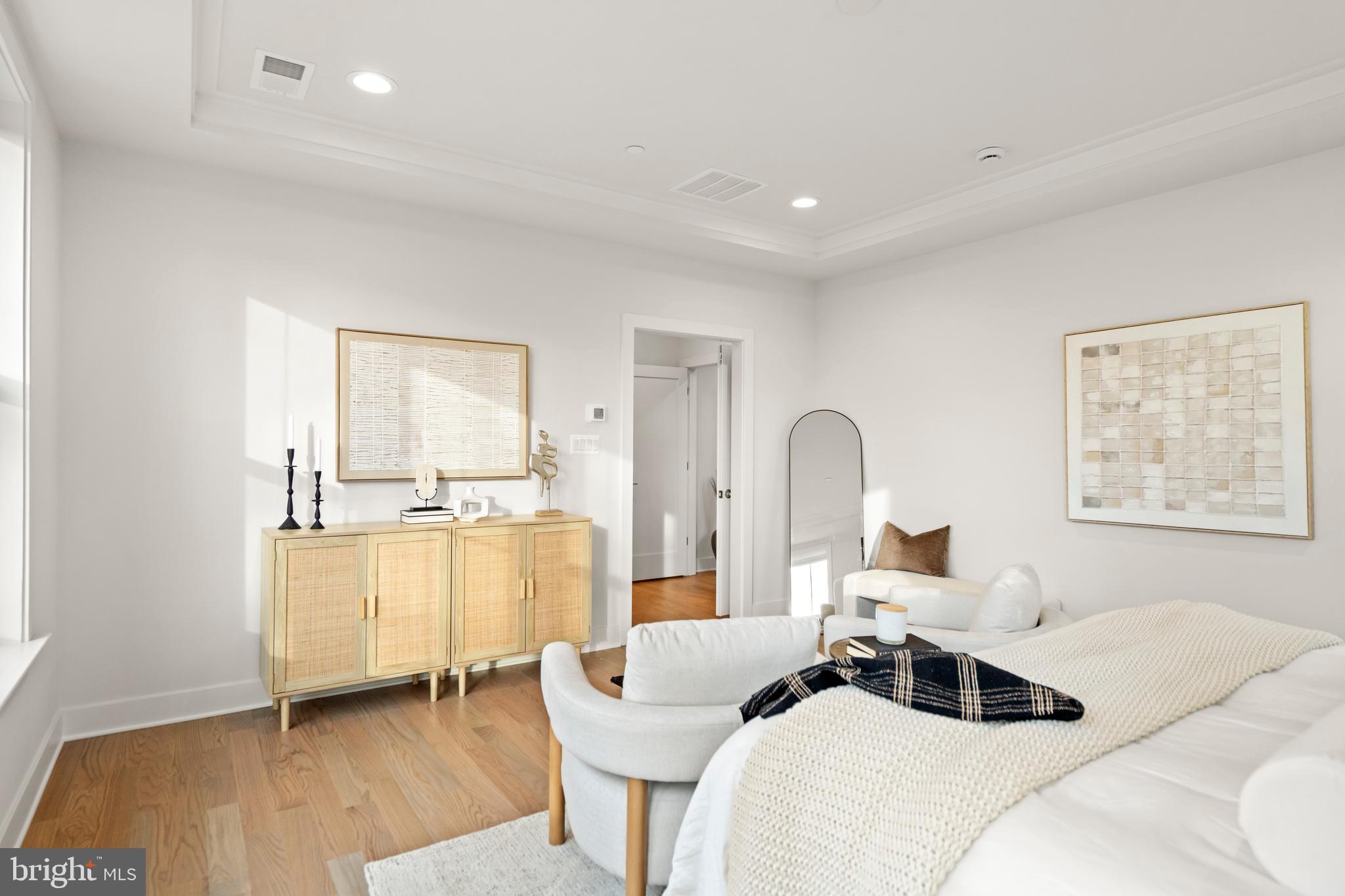 8506 Hempstead Avenue Bethesda, MD 20817 - Photo 28 of 57 a living room with furniture and a wooden floor