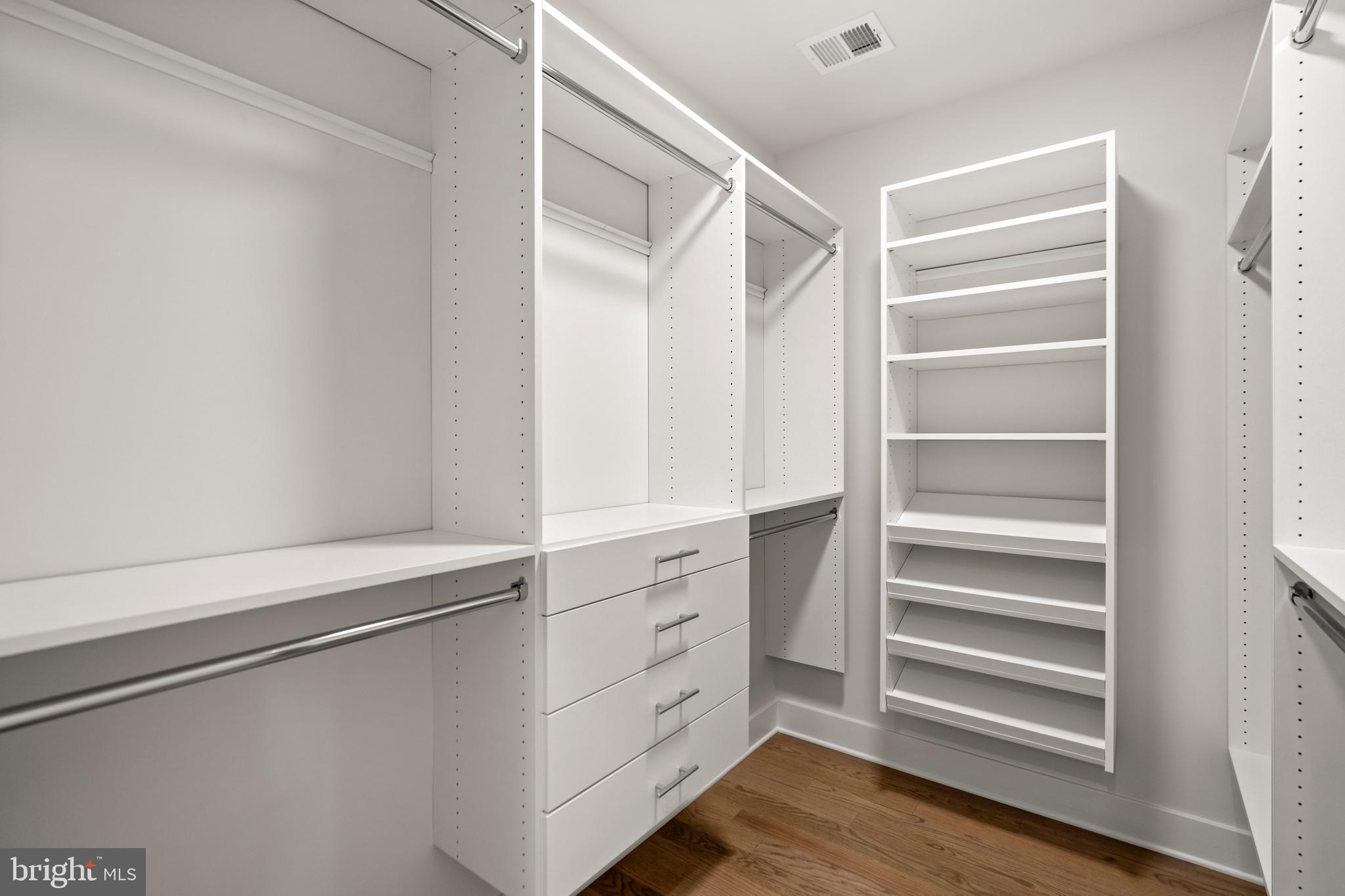 8506 Hempstead Avenue Bethesda, MD 20817 - Photo 31 of 57 a view of walk in closet with empty racks