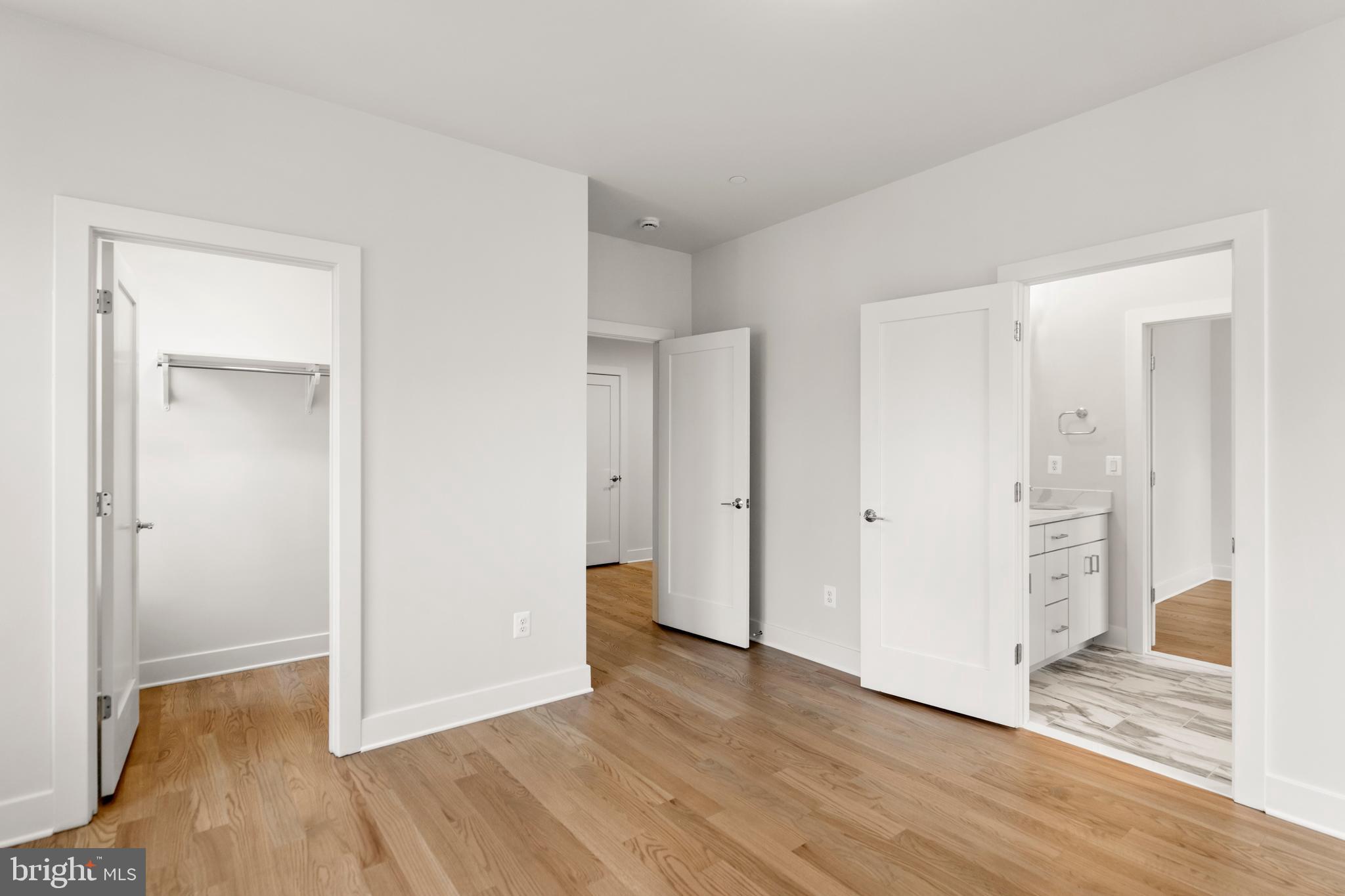 8506 Hempstead Avenue Bethesda, MD 20817 - Photo 36 of 57 a view of hallway with wooden floor