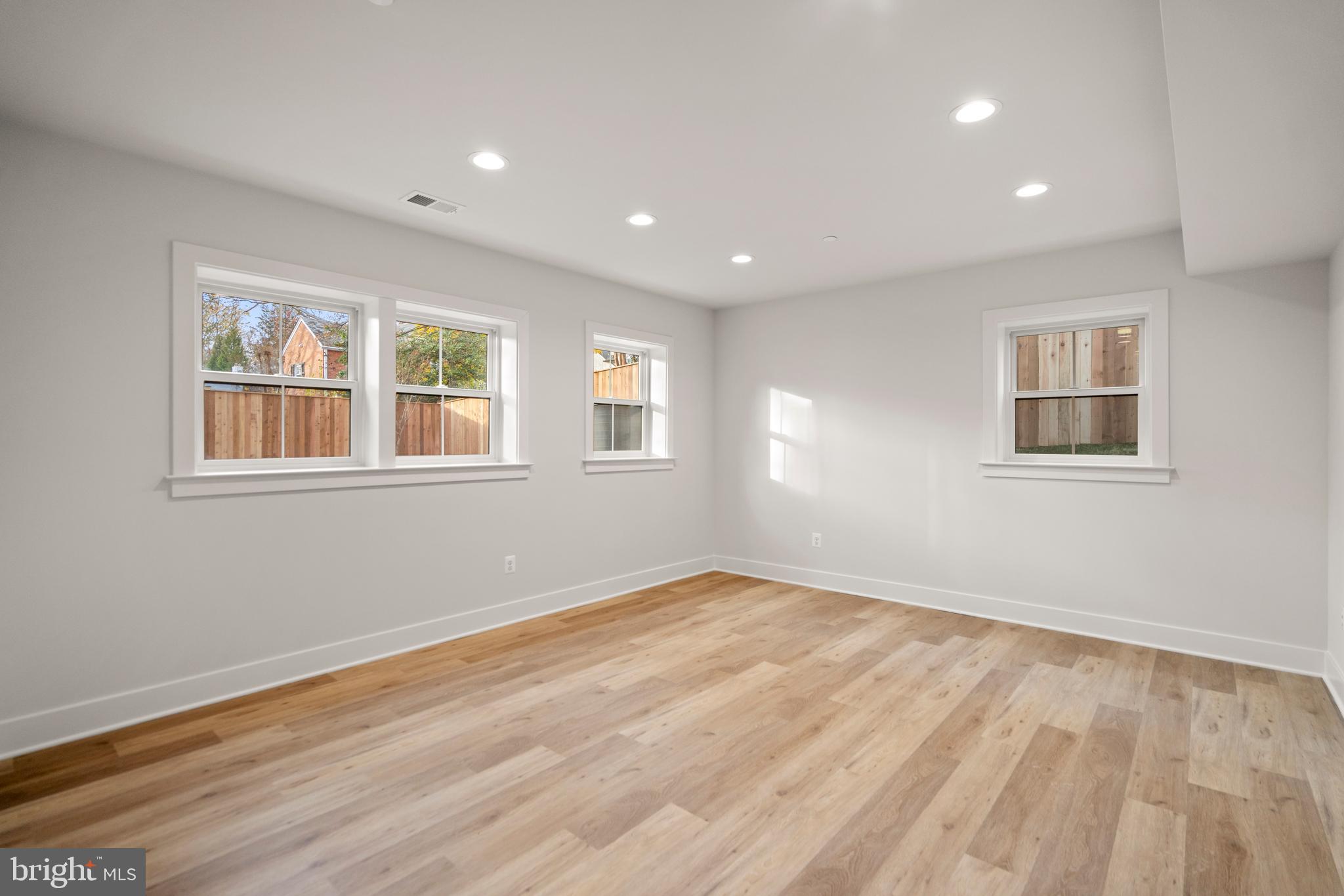 8506 Hempstead Avenue Bethesda, MD 20817 - Photo 48 of 57 a view of empty room with wooden floor and fan