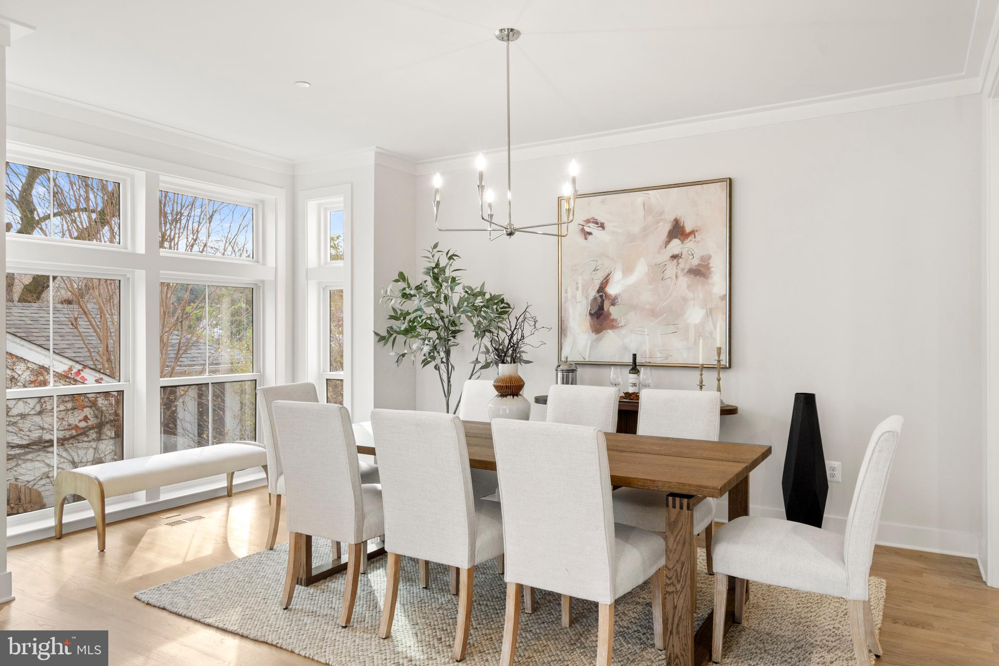 8506 Hempstead Avenue Bethesda, MD 20817 - Photo 8 of 57 a view of a dining room with furniture window and wooden floor