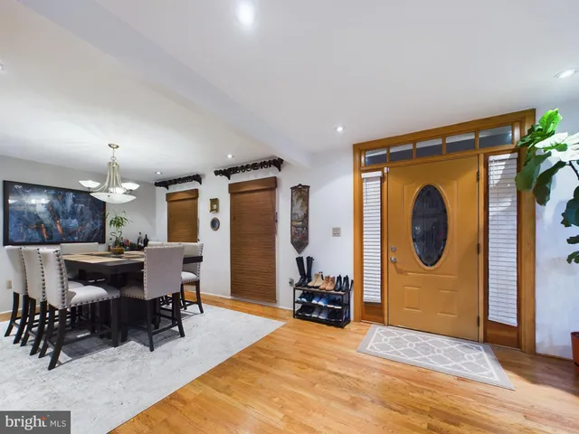 a view of a livingroom with furniture and a workspace