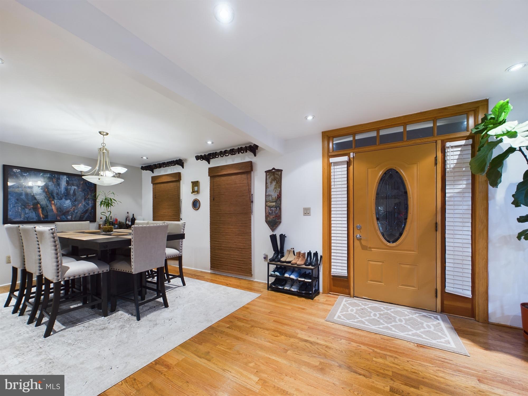 2906 Cedar Lane Vienna, VA 22180 - Photo 2 of 18 a view of a livingroom with furniture and a workspace