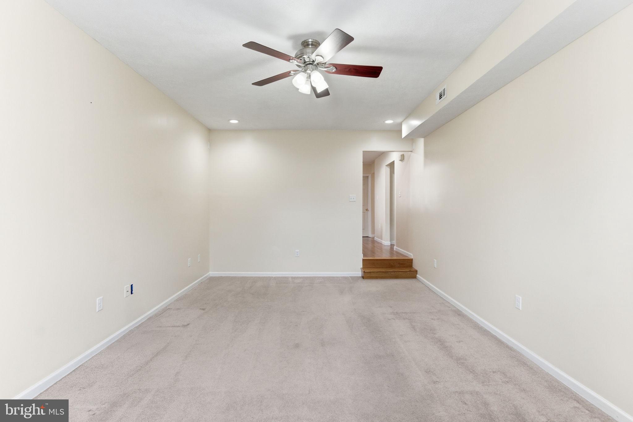 148 Vinca Lane Falling Waters, WV 25419 - Photo 20 of 71 an empty room with closet and a ceiling fan