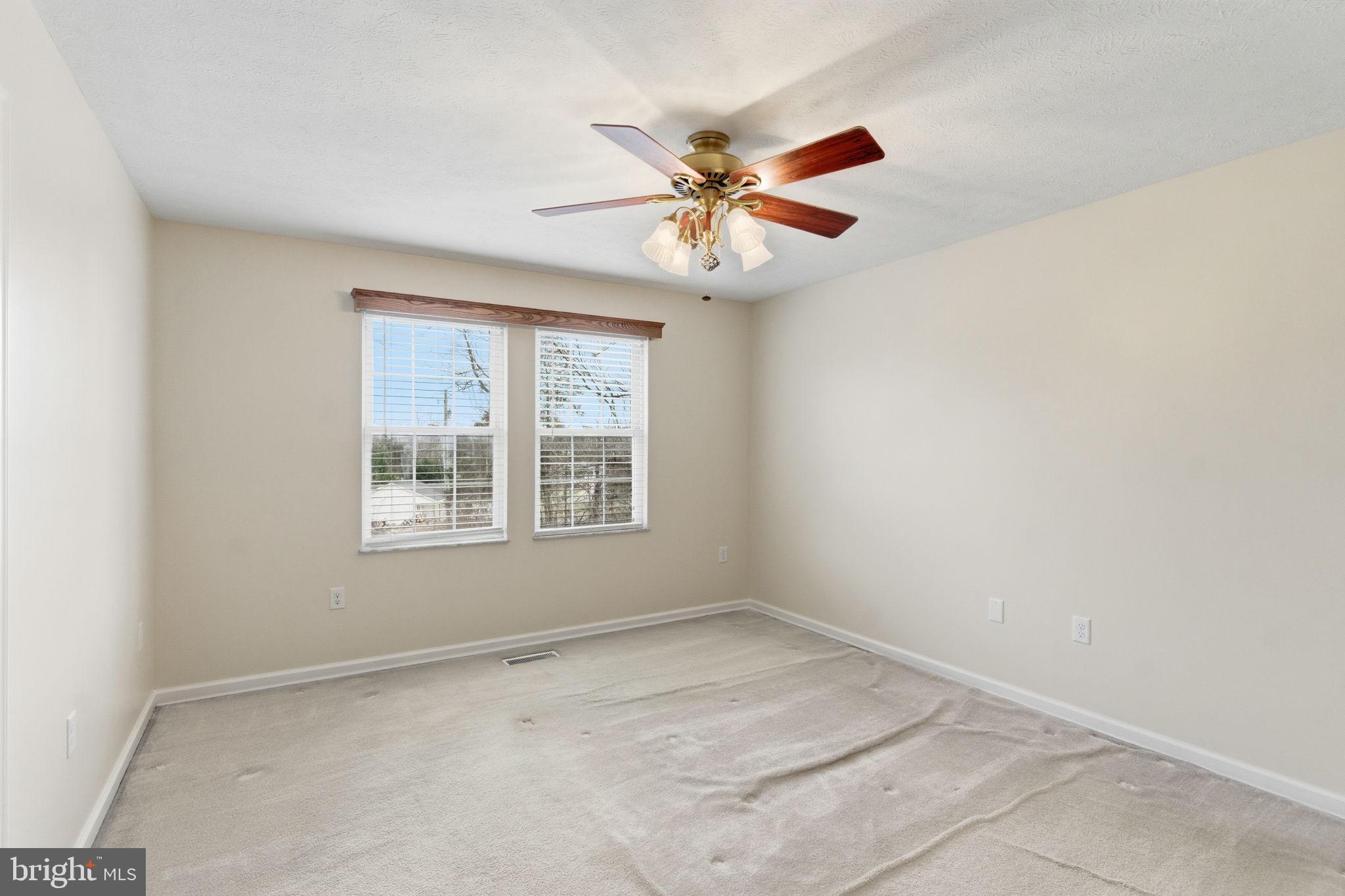 148 Vinca Lane Falling Waters, WV 25419 - Photo 22 of 71 a view of an empty room with a window