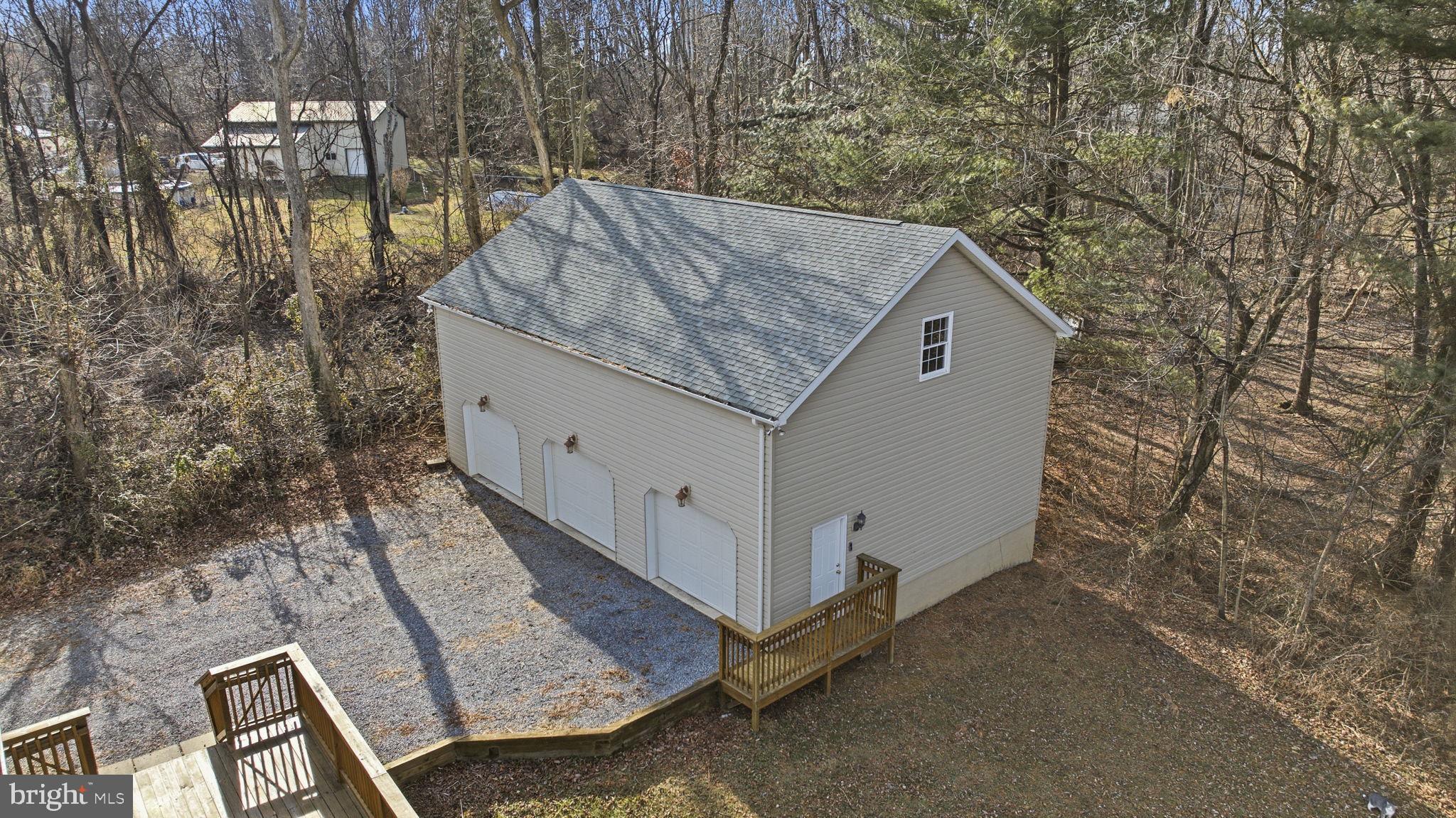 148 Vinca Lane Falling Waters, WV 25419 - Photo 43 of 71 a house view with a backyard space