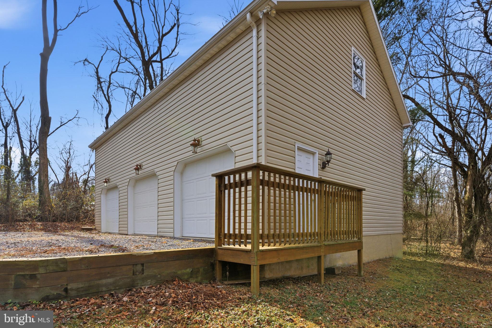 148 Vinca Lane Falling Waters, WV 25419 - Photo 45 of 71 a front view of a house with a yard