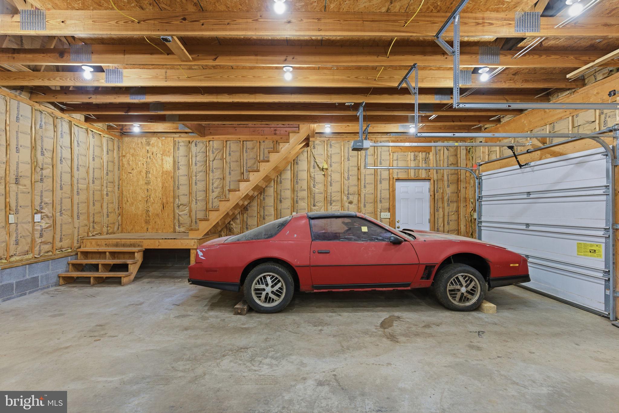 148 Vinca Lane Falling Waters, WV 25419 - Photo 46 of 71 a view of a car in garage