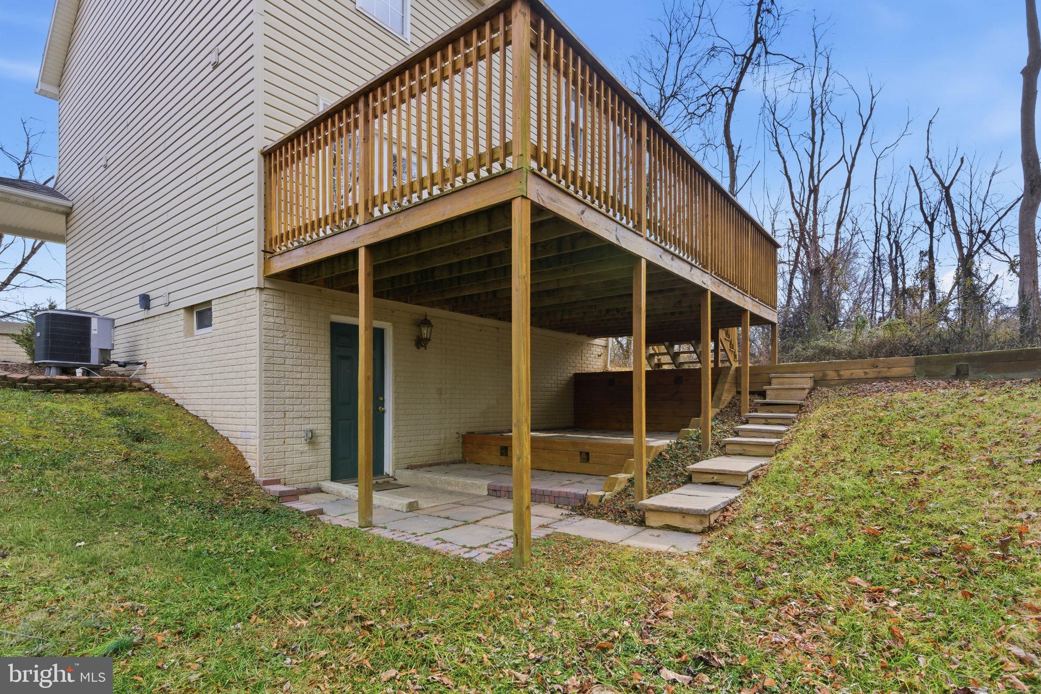 148 Vinca Lane Falling Waters, WV 25419 - Photo 54 of 71 a backyard of a house with table and chairs