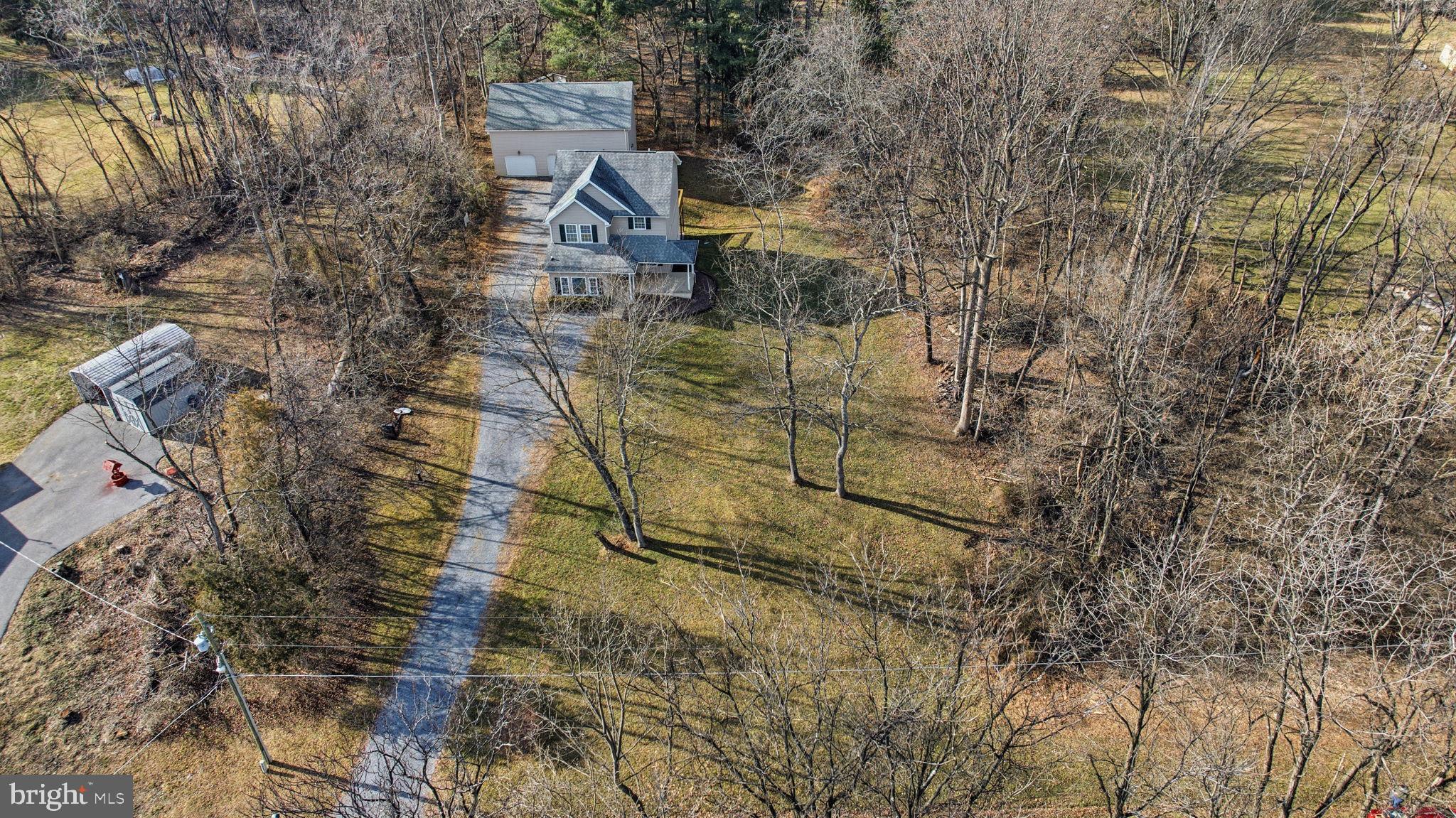 148 Vinca Lane Falling Waters, WV 25419 - Photo 61 of 71 a aerial view of a house with a yard