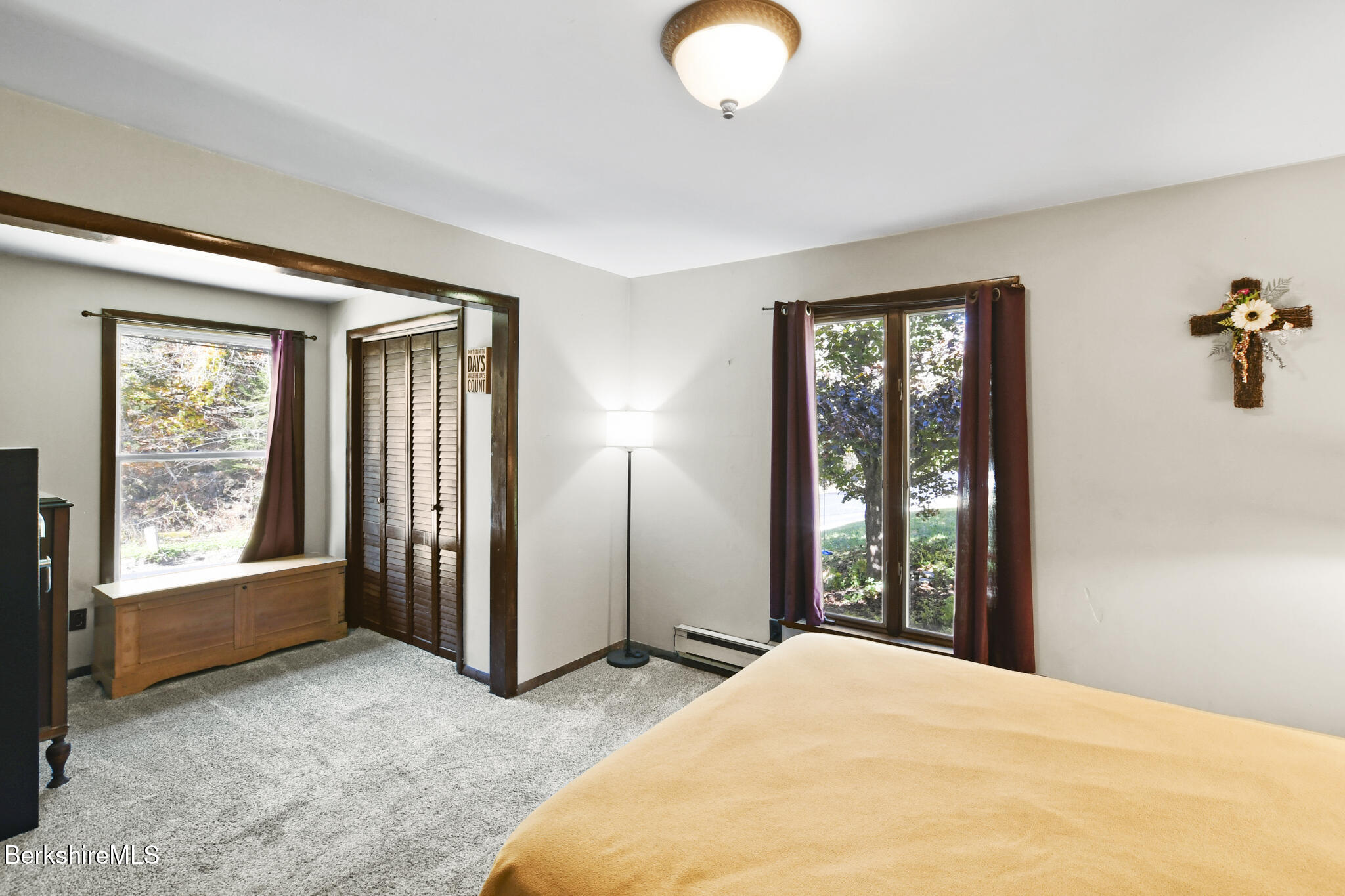 74 Old Main Road Savoy, MA 01256 - Photo 30 of 42 a view of a room with large windows and closet