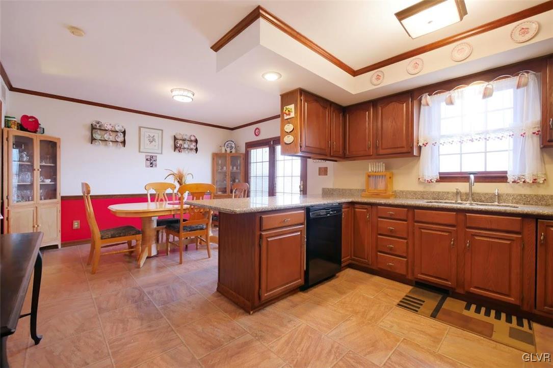 241 Maple Street Coplay, PA 18037 - Photo 8 of 31 Granite countertops, peninsula with overhang offer