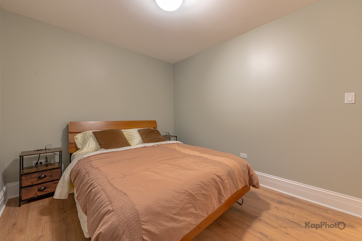 3639 North Troy Street, Unit 2 Chicago, IL 60618 - Photo 19 of 30 a bedroom with a bed and wooden floor