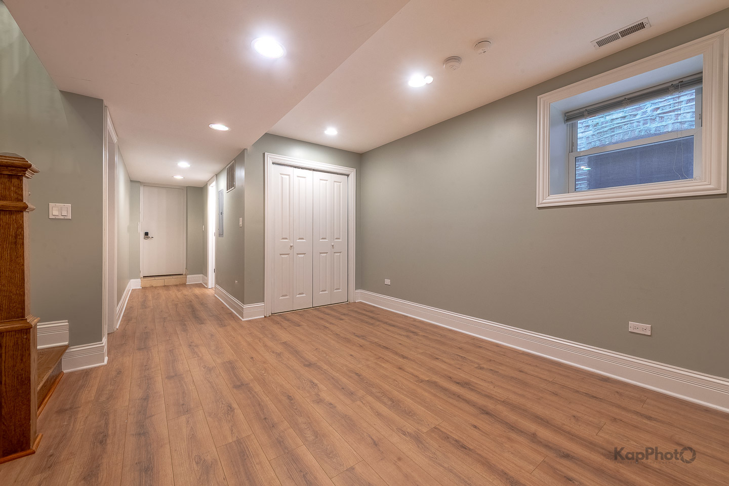 3639 North Troy Street, Unit 2 Chicago, IL 60618 - Photo 26 of 30 a view of an empty room with wooden floor